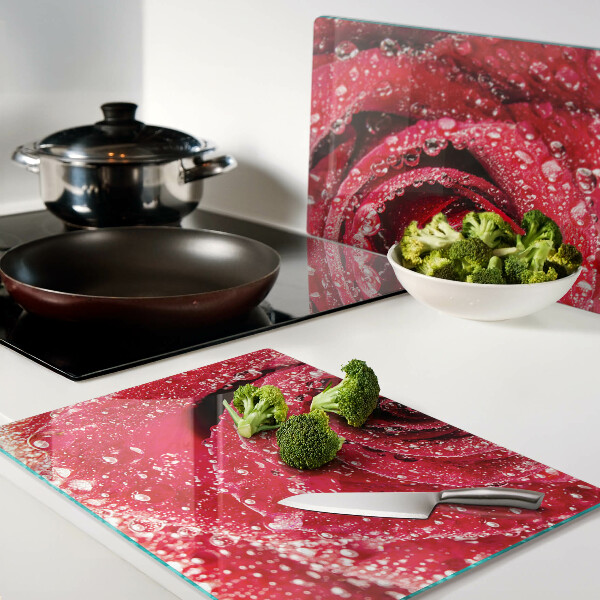 Tagliere in vetro temperato con motivo di rosa rossa e gocce d'acqua