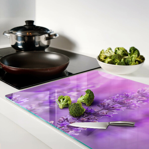 Tagliere in vetro temperato con motivo di fiori di lavanda su sfondo porpora