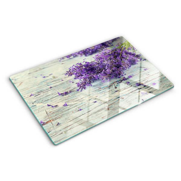 Tagliere in vetro con stampa di lavanda su sfondo di legno