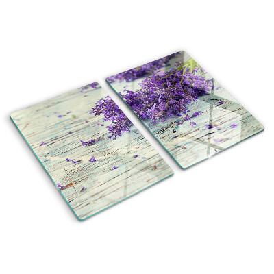 Tagliere in vetro con stampa di lavanda su sfondo di legno