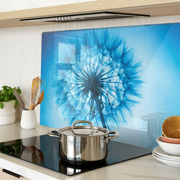 Tagliere in vetro con motivo di dente di leone su sfondo blu