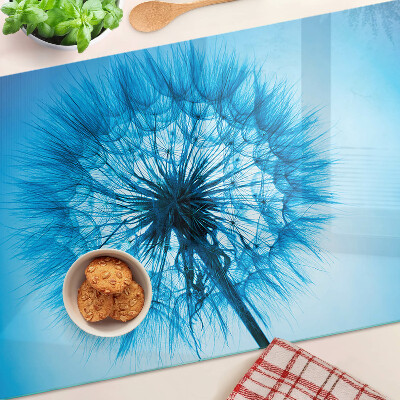 Tagliere in vetro con motivo di dente di leone su sfondo blu