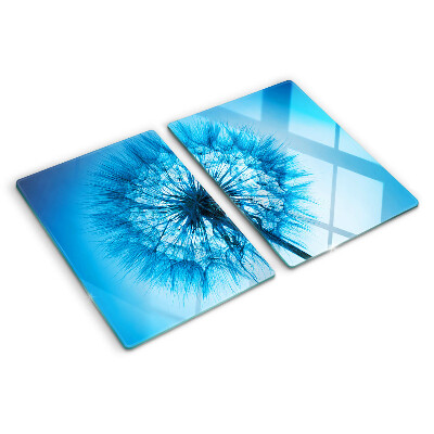 Tagliere in vetro con motivo di dente di leone su sfondo blu