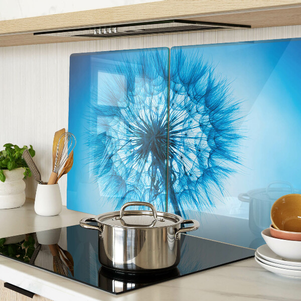 Tagliere in vetro con motivo di dente di leone su sfondo blu