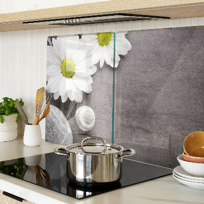 Tagliere in vetro temperato con decorazione a fiori e motivi pietrosi sullo sfondo