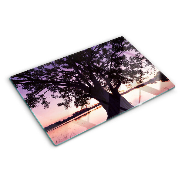 Tagliere in vetro con decorazione a motivo di albero al tramonto