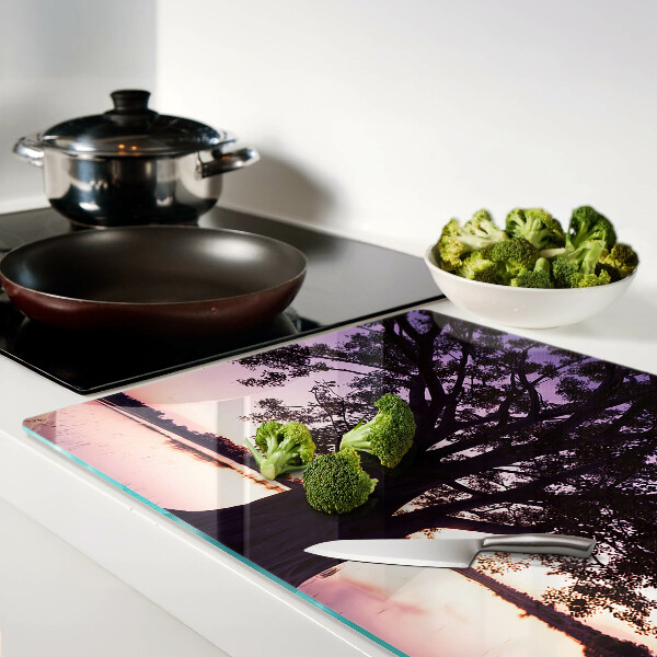 Tagliere in vetro con decorazione a motivo di albero al tramonto