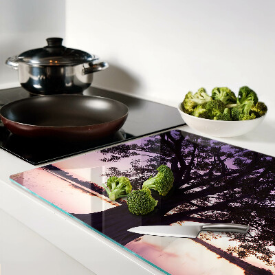 Tagliere in vetro con decorazione a motivo di albero al tramonto