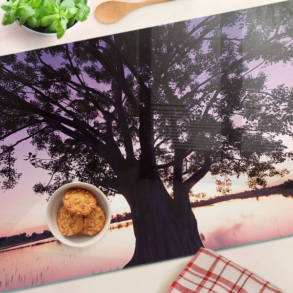 Tagliere in vetro con decorazione a motivo di albero al tramonto