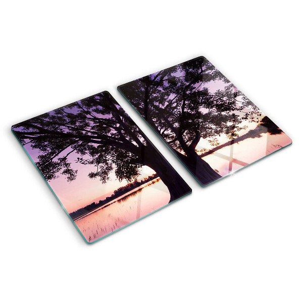 Tagliere in vetro con decorazione a motivo di albero al tramonto