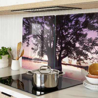 Tagliere in vetro con decorazione a motivo di albero al tramonto