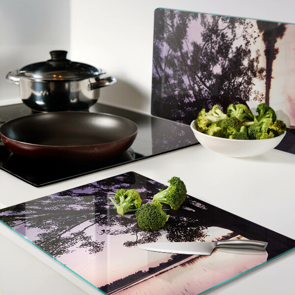 Tagliere in vetro con decorazione a motivo di albero al tramonto