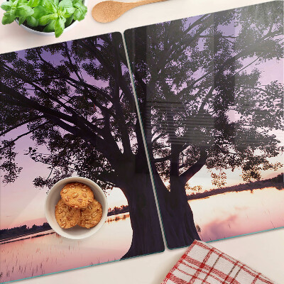 Tagliere in vetro con decorazione a motivo di albero al tramonto