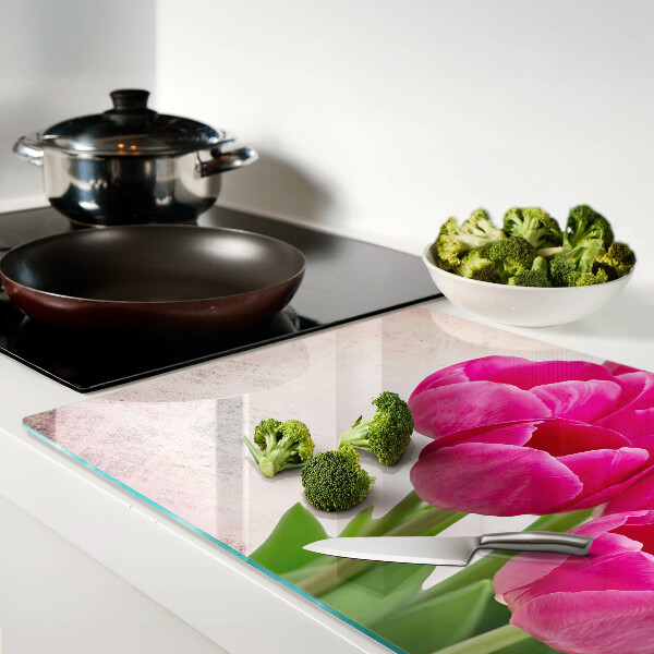 Tagliere in vetro temperato con motivo di tulipani su sfondo rosa
