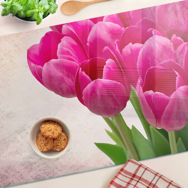 Tagliere in vetro temperato con motivo di tulipani su sfondo rosa