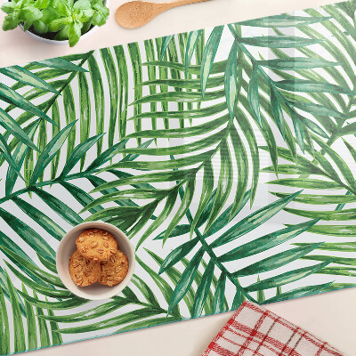 Tagliere in vetro temperato con motivo a foglie di palma nei toni del verde