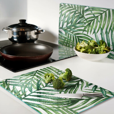 Tagliere in vetro temperato con motivo a foglie di palma nei toni del verde