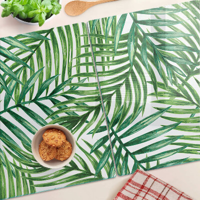 Tagliere in vetro temperato con motivo a foglie di palma nei toni del verde