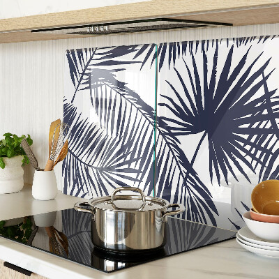 Tagliere in vetro con stampa di foglie di palma su sfondo bianco