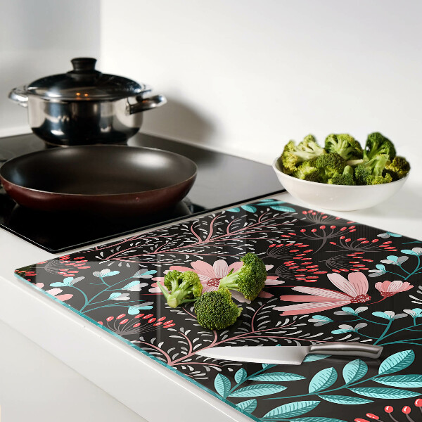 Tagliere in vetro temperato con motivo floreale su sfondo scuro