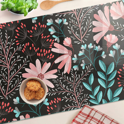 Tagliere in vetro temperato con motivo floreale su sfondo scuro