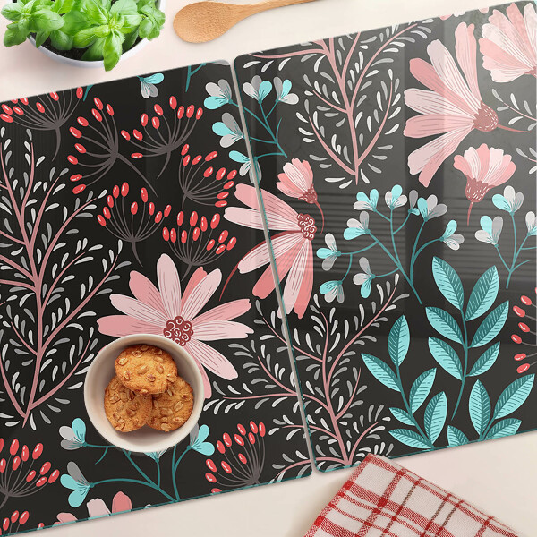 Tagliere in vetro temperato con motivo floreale su sfondo scuro