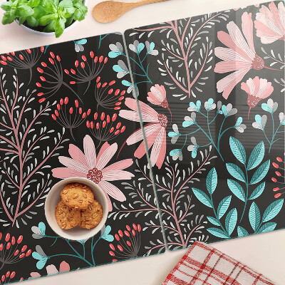 Tagliere in vetro temperato con motivo floreale su sfondo scuro