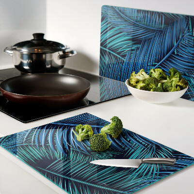 Tagliere in vetro temperato con decorazione a foglie di palma nei toni del blu