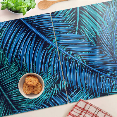 Tagliere in vetro temperato con decorazione a foglie di palma nei toni del blu