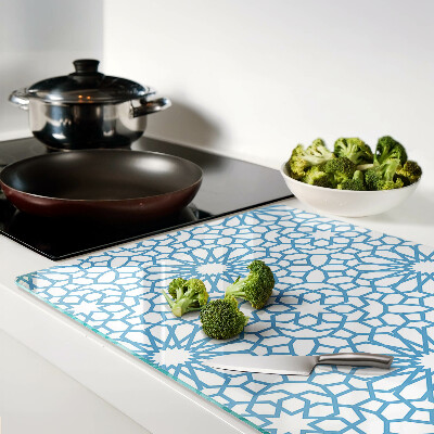 Tagliere in vetro con motivo floreale nei toni del blu