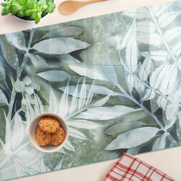 Tagliere in vetro temperato con motivo di foglie tropicali in tonalità pastello