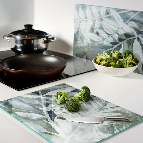 Tagliere in vetro temperato con motivo di foglie tropicali in tonalità pastello