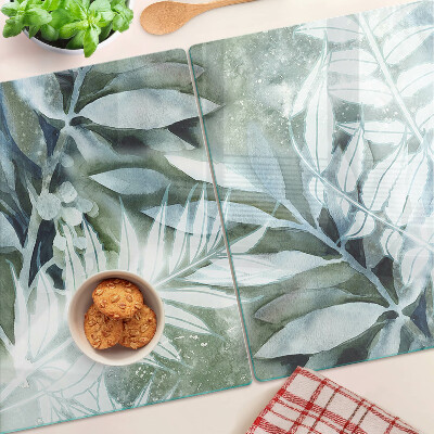 Tagliere in vetro temperato con motivo di foglie tropicali in tonalità pastello