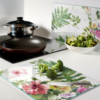 Tagliere in vetro con motivo floreale e foglie