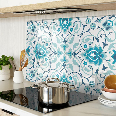 Tagliere in vetro con motivo floreale nei toni del blu