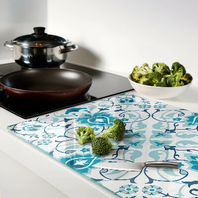 Tagliere in vetro con motivo floreale nei toni del blu