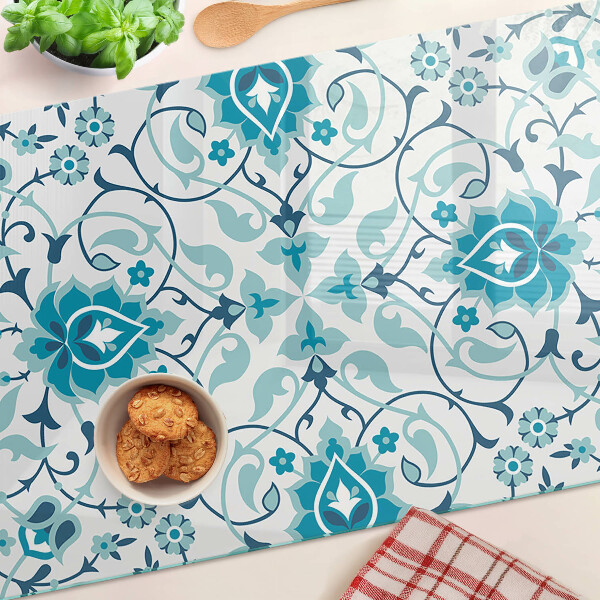 Tagliere in vetro con motivo floreale nei toni del blu