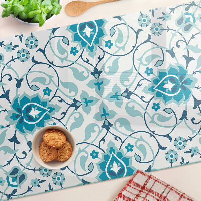 Tagliere in vetro con motivo floreale nei toni del blu