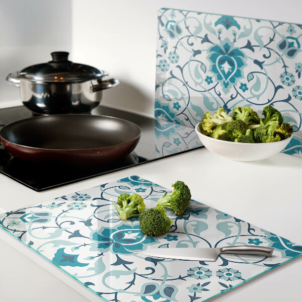 Tagliere in vetro con motivo floreale nei toni del blu