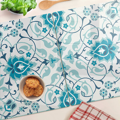 Tagliere in vetro con motivo floreale nei toni del blu