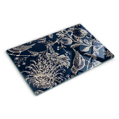 Tagliere in vetro temperato con motivo di fiori e uccelli su sfondo scuro