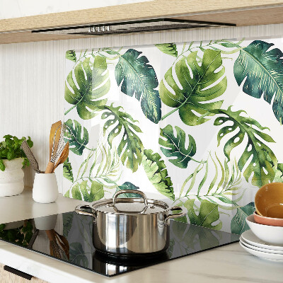 Tagliere in vetro temperato con motivo di foglie di monstera nei toni del verde