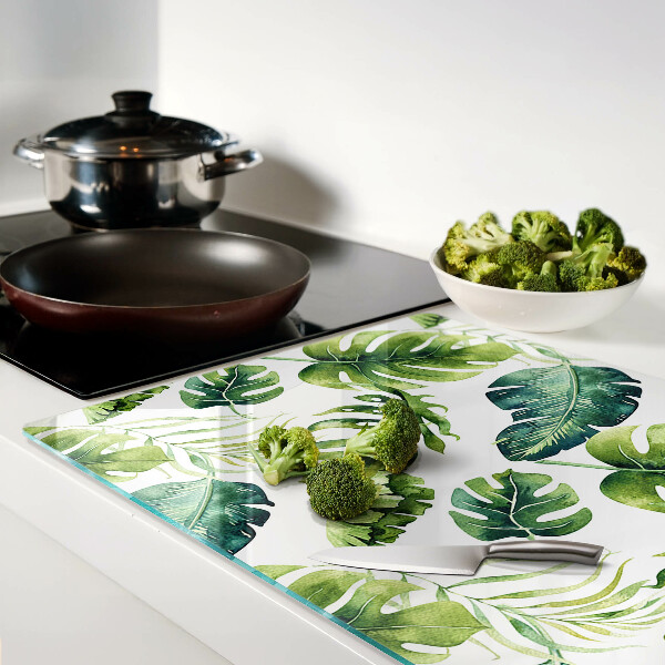 Tagliere in vetro temperato con motivo di foglie di monstera nei toni del verde