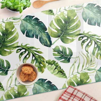 Tagliere in vetro temperato con motivo di foglie di monstera nei toni del verde
