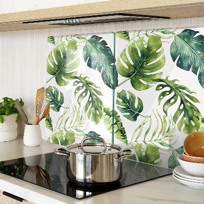 Tagliere in vetro temperato con motivo di foglie di monstera nei toni del verde