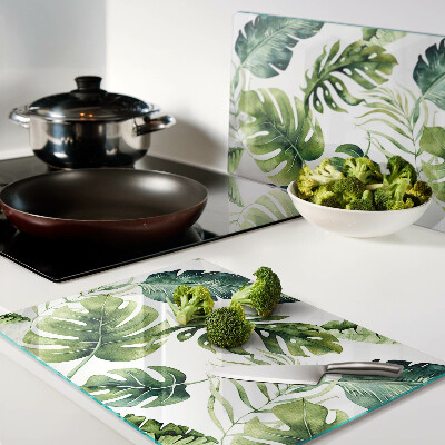 Tagliere in vetro temperato con motivo di foglie di monstera nei toni del verde