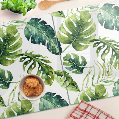 Tagliere in vetro temperato con motivo di foglie di monstera nei toni del verde