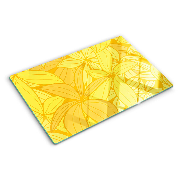 Tagliere in vetro temperato con motivo di foglie gialle in stile tropicale