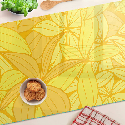 Tagliere in vetro temperato con motivo di foglie gialle in stile tropicale