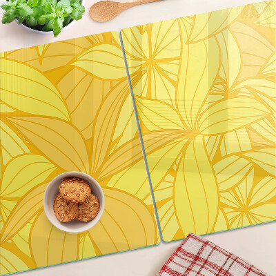 Tagliere in vetro temperato con motivo di foglie gialle in stile tropicale